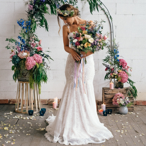Industrial Wedding Inspiration with Pastel Floral Arch