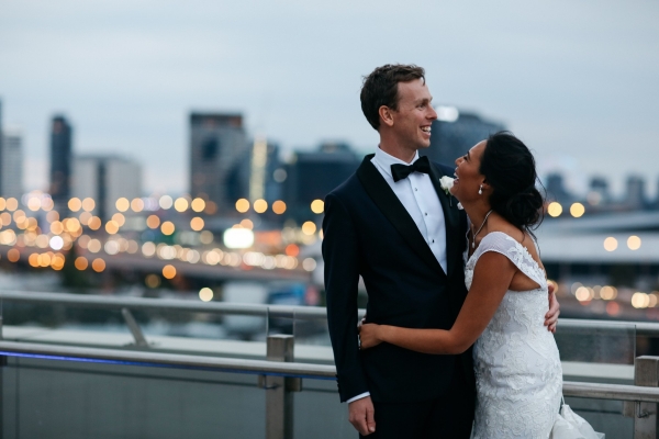 Happy Bride and Groom On Rooftop