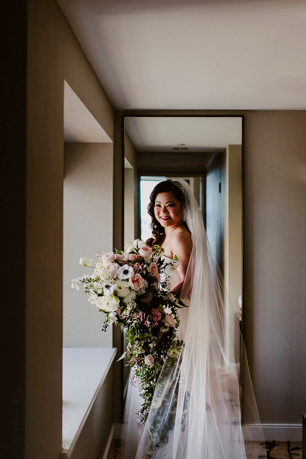 Bride with cascading bouquet