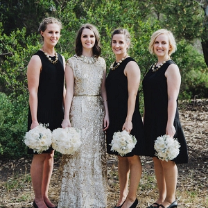 Bride In Gold With Black Bridesmaid Dresses