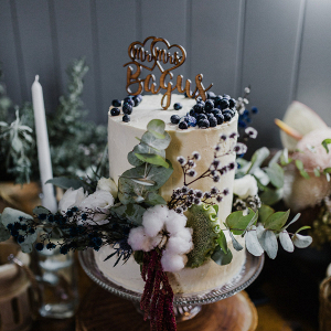 Small wedding cake with organic florals