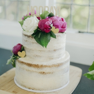 White Wedding Cake With Pink Peonies