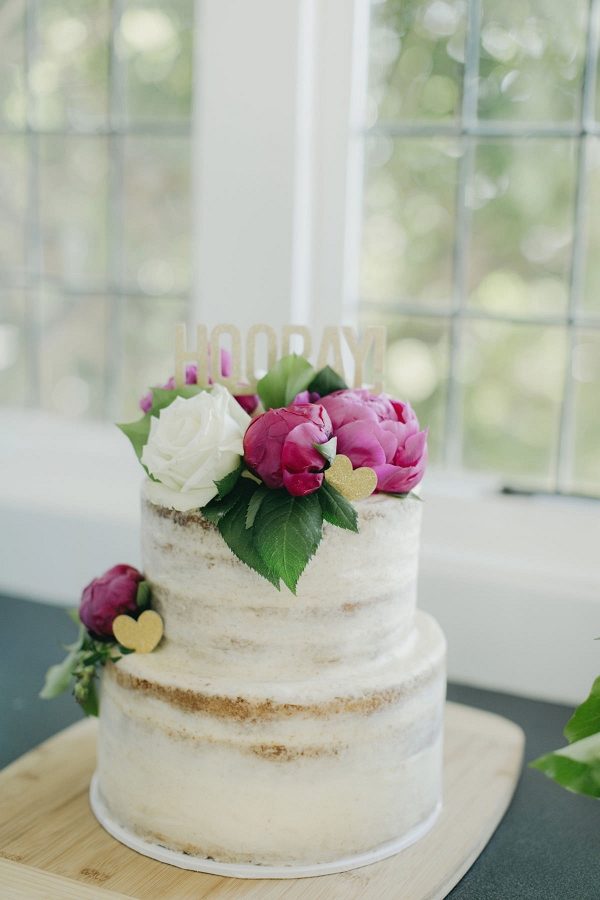 White Wedding Cake With Pink Peonies
