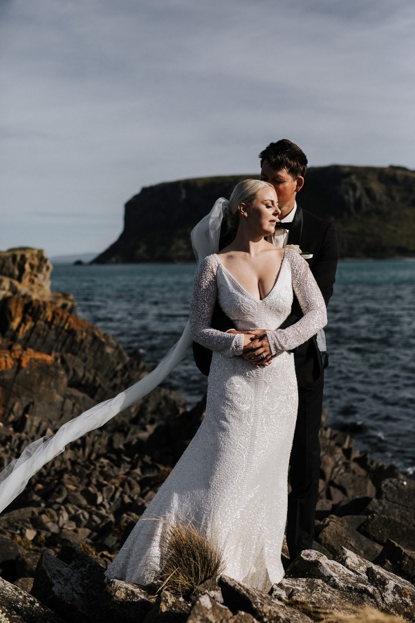 Dramatic coastal Tasmania wedding portrait