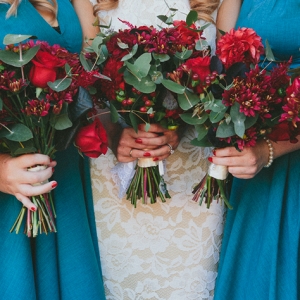 Red Bouquets With Teal Dresses