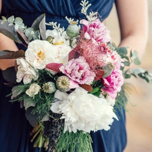 A Pink And Cream Bouquet With Peonies