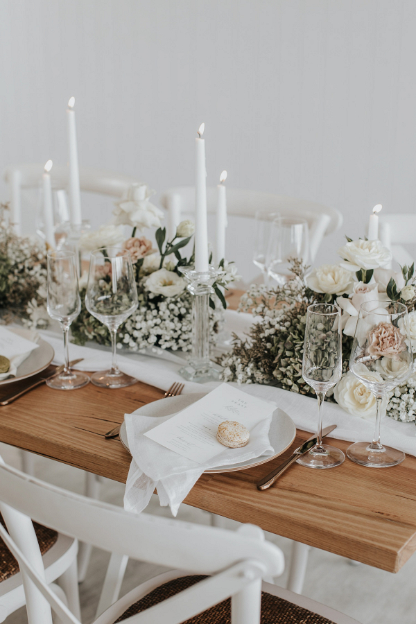 Romantic white and blush wedding tablescape