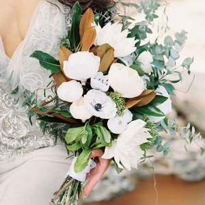 White bouquet with magnolia leaves