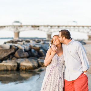 Kiss by the rocks with the engagement rock