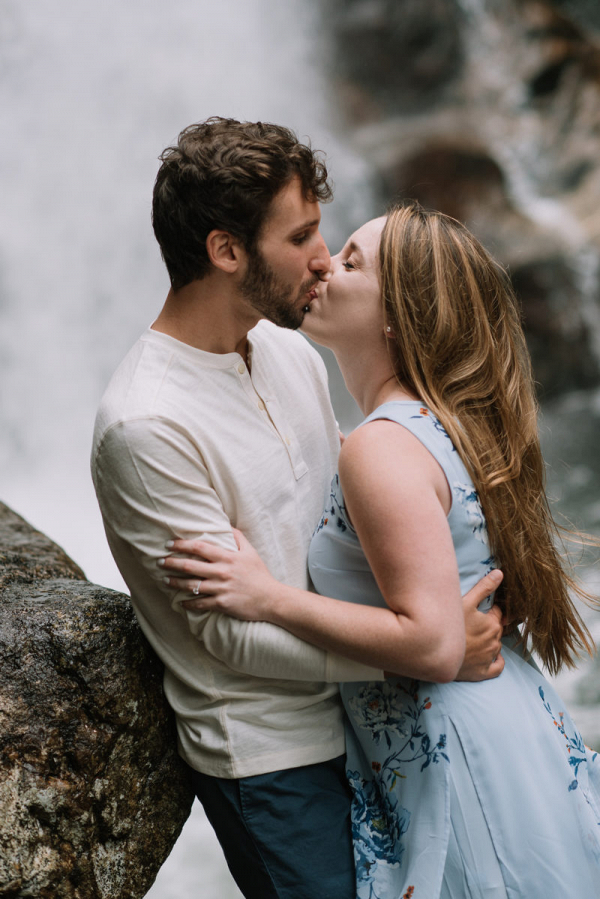Kiss beside the waterfall