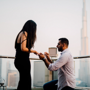 Romantic cityscape engagement in Dubai
