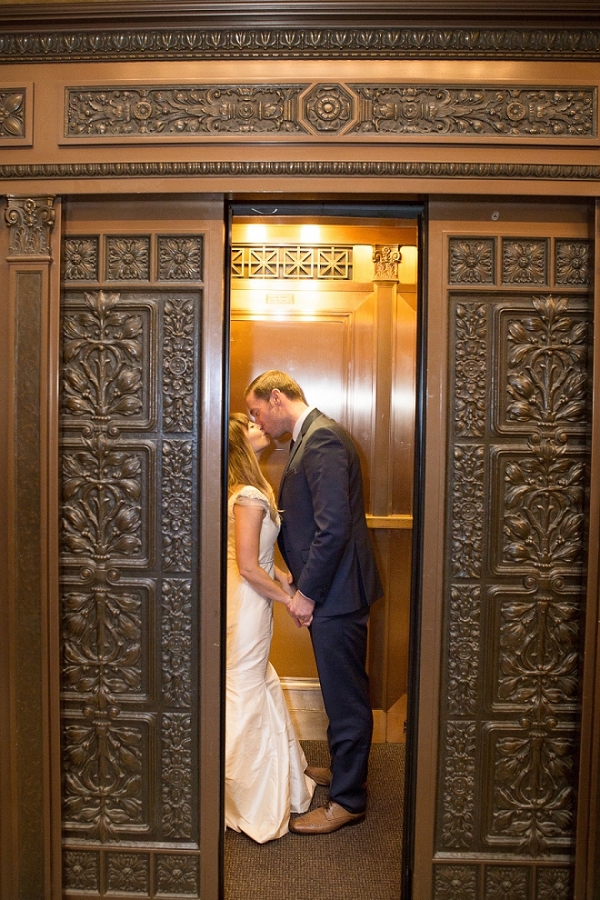 Bride and groom kissing in the elevator of the Carnegie Museum of Art!