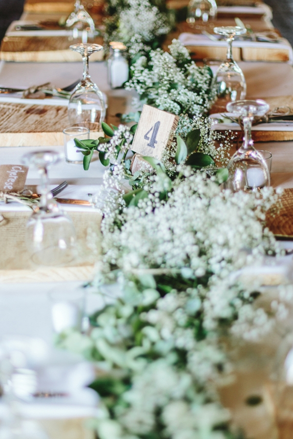 Rustic table with greenery runner