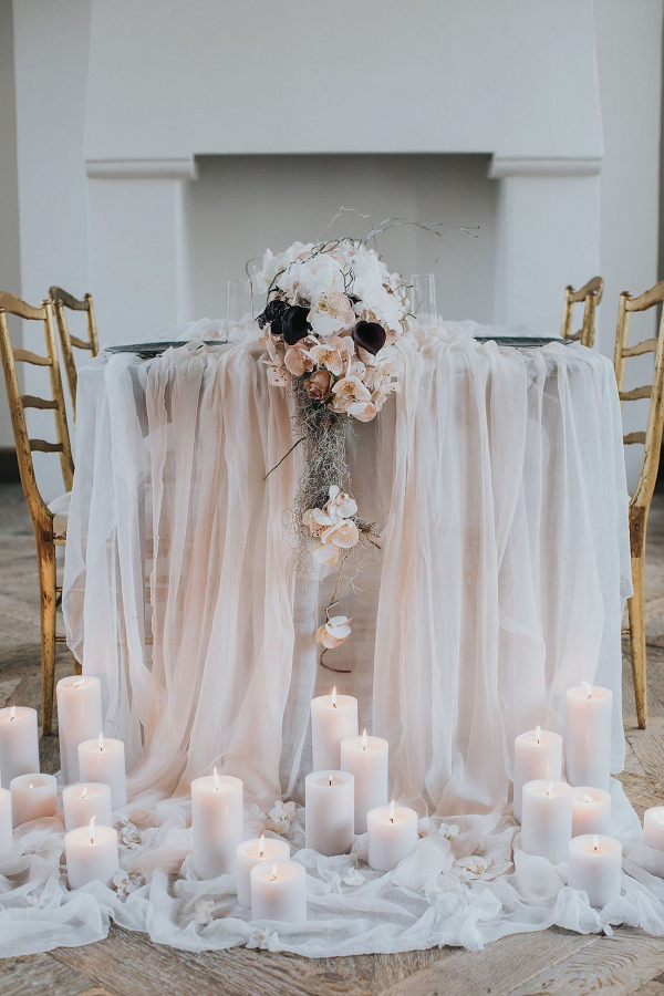 Table with Silk Linens and Candle Arrangement