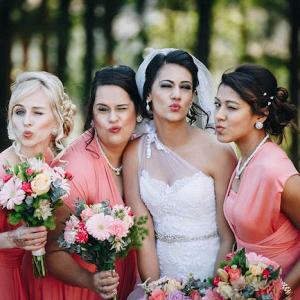 Bridesmaids in Coral Dresses
