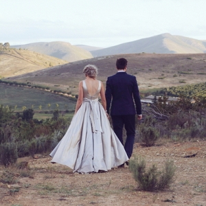 Bride & groom in South African landscape