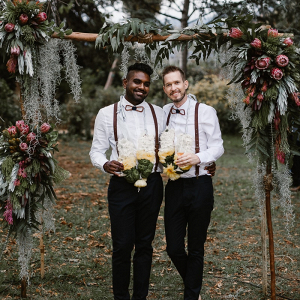 Grooms with Protea Wedding Arch