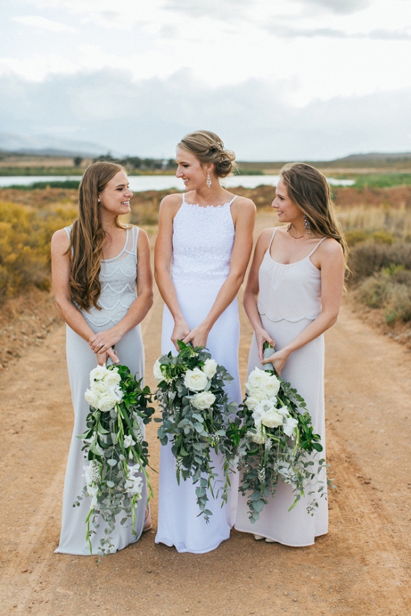 Bride & bridesmaids with oversize bouquets