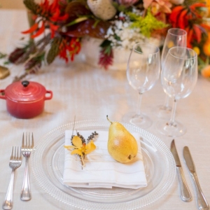 Bright place setting with pear