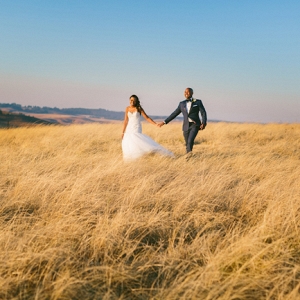 Bride and groom in landscape