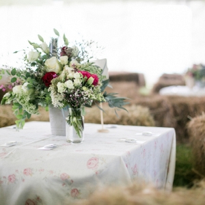 Marquee Reception with Hay Bales and Floral Print Linens
