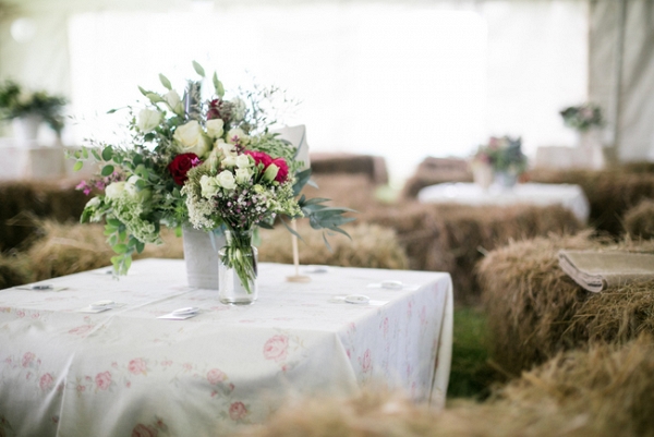 Marquee Reception with Hay Bales and Floral Print Linens
