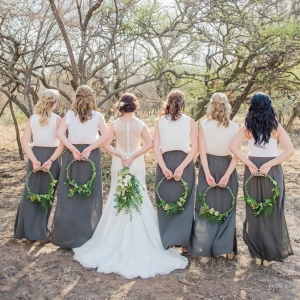 Bridesmaids in tops and skirts