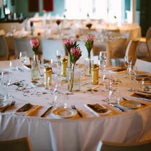 Tables with Protea Centerpiece