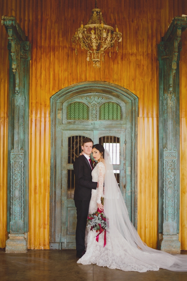 Bride and Groom with Ornate Door Background