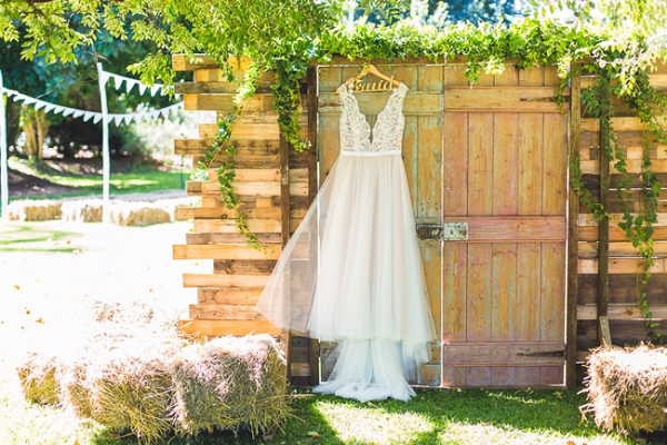 Lace Wedding Dress on Wooden Door