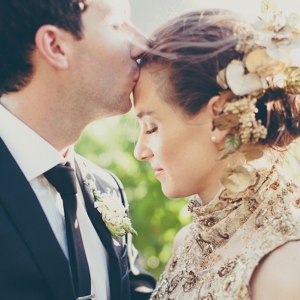 Groom and bride in gold dress