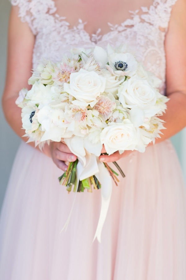 Blushing bride protea and anemone wedding bouquet