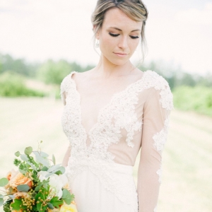 Bride in lace sleeve dress