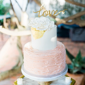 Pink and gold ruffle wedding cake