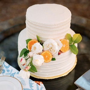Citrus and floral wedding cake