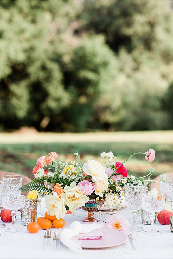 Colorful citrus wedding tablescape