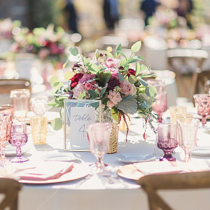 Elegant pink and burgundy ranch wedding table