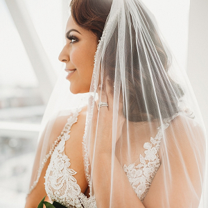 Bride with beaded veil