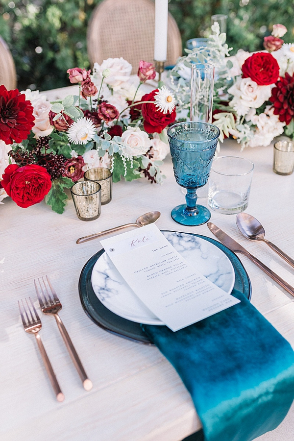 Romantic blue and burgundy wedding tablescape
