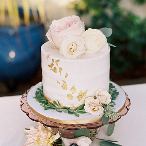 Small wedding cake with gold flakes