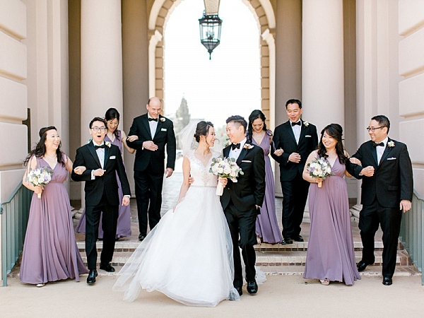 Purple bridesmaid dresses and tuxedo bridal party