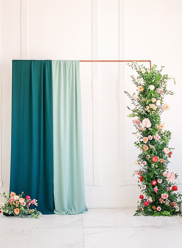 Copper pipe and draping ceremony backdrop