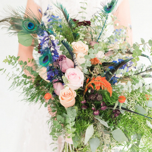 Bridal bouquet with peacock feathers