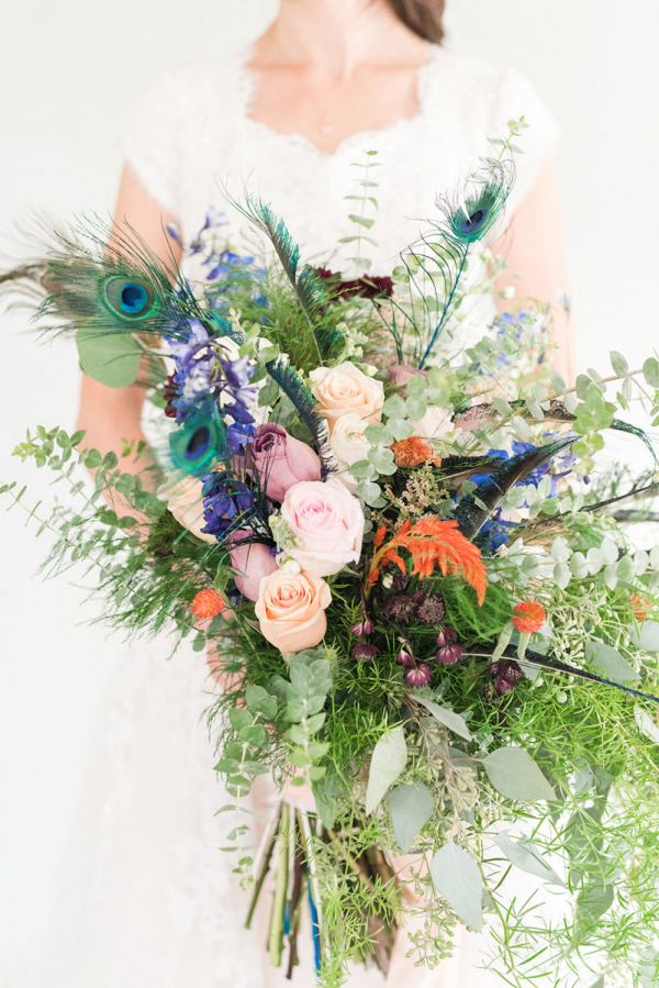 Bridal bouquet with peacock feathers