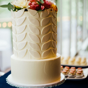 Two tiered white wedding cake