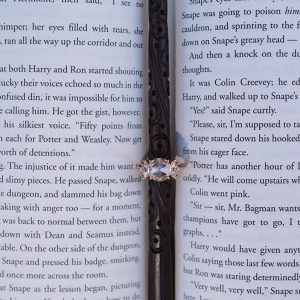 Engagement ring on a Harry Potter book