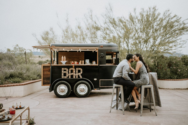 The bride, the groom and the bar cart