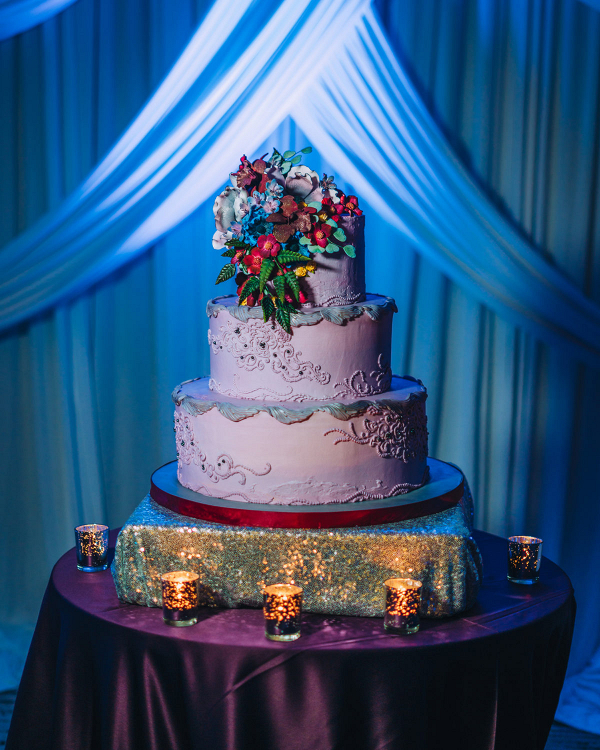 Three tier white wedding cake