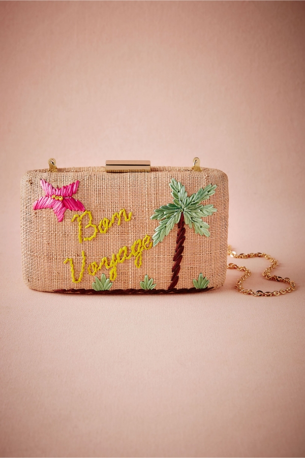 Embroidered straw clutch for a tropical getaway