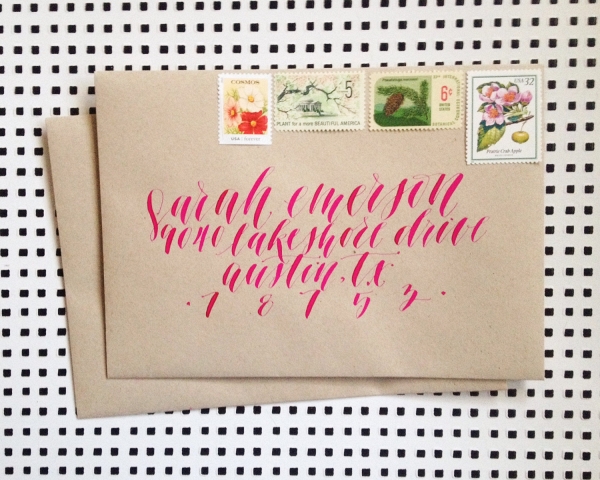 Whimsical and modern wedding calligraphy in fuchsia ink on kraft paper